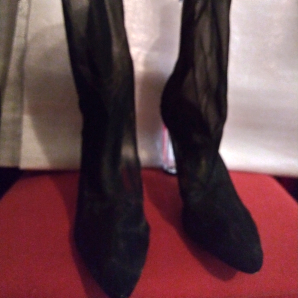 Elegant Black Sheer Booties.Black Patten Leather trim. Classy 4in. Clear heel.